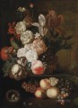 Roses tulips violets and other flowers in a wicker basket on a stone ledge with grapes peaches and a nest with eggs Jan van Huysum